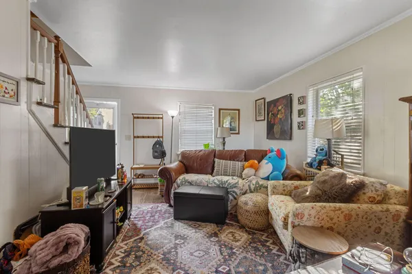 a kitchen with stainless steel appliances granite countertop a refrigerator stove and sink