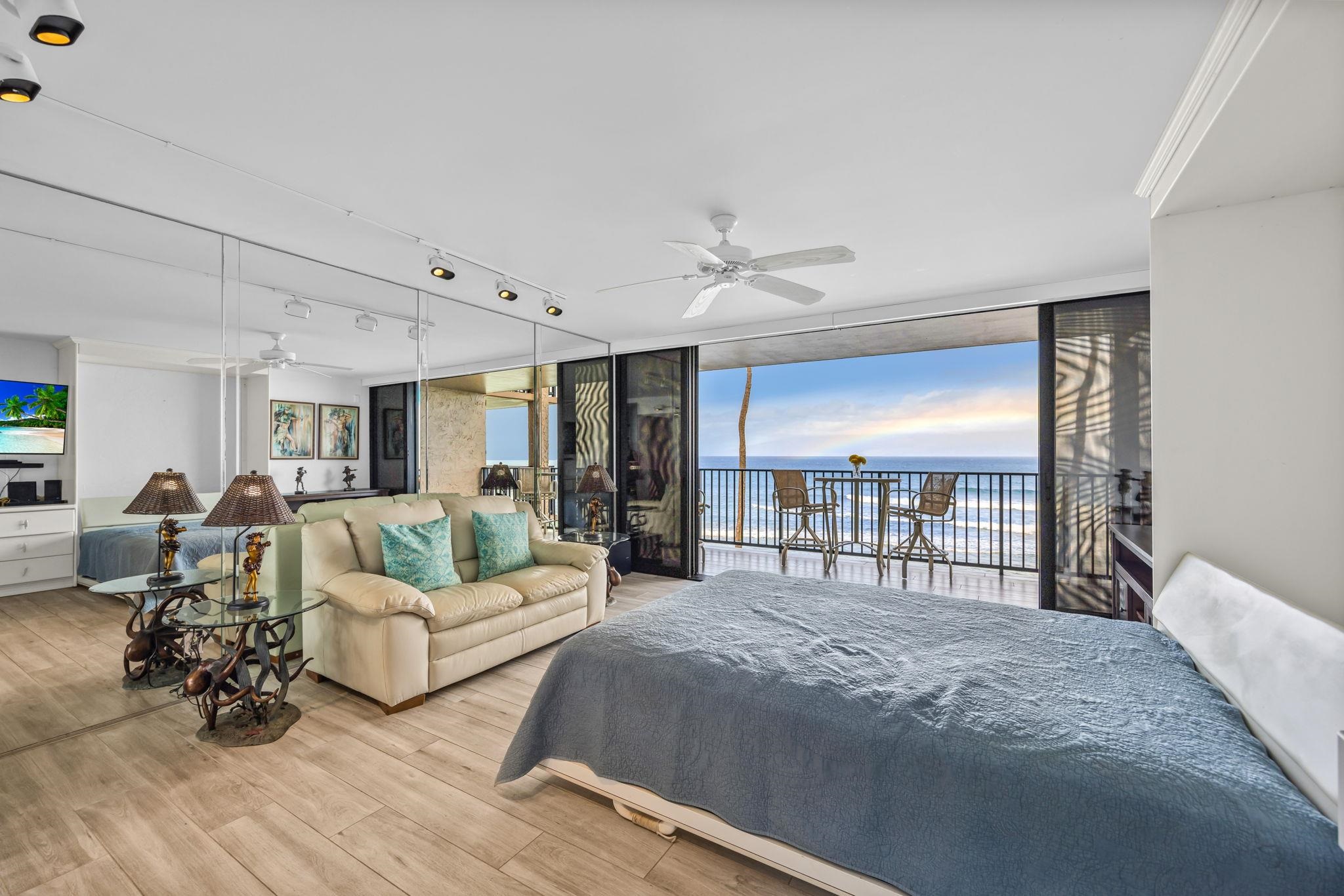 3543 Lower Honoapiilani Road, Unit F303 Lahaina, HI 96761 - Photo 11 of 20 a living room with furniture and a wooden floor
