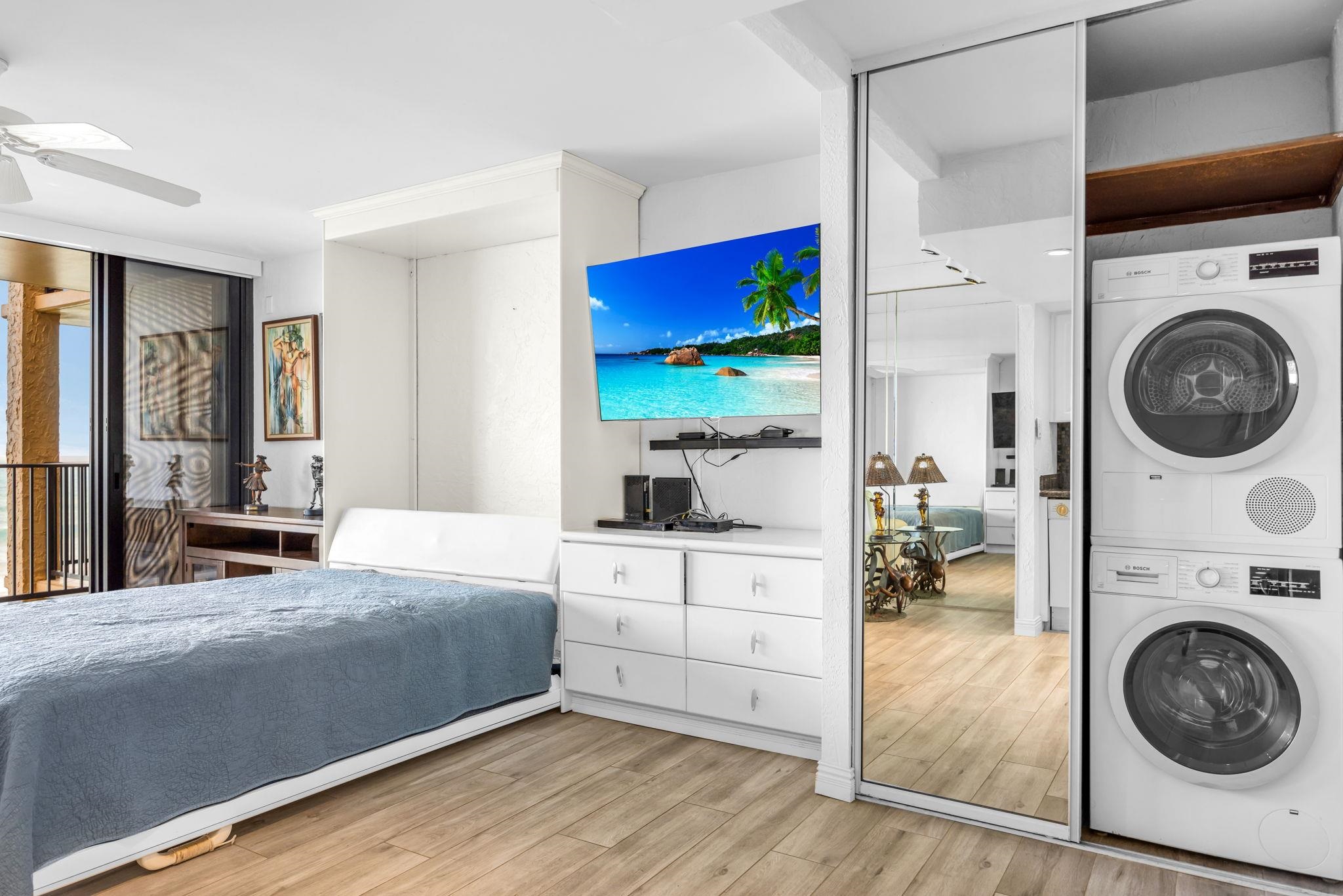 3543 Lower Honoapiilani Road, Unit F303 Lahaina, HI 96761 - Photo 14 of 20 a bedroom with a bed and a view of kitchen