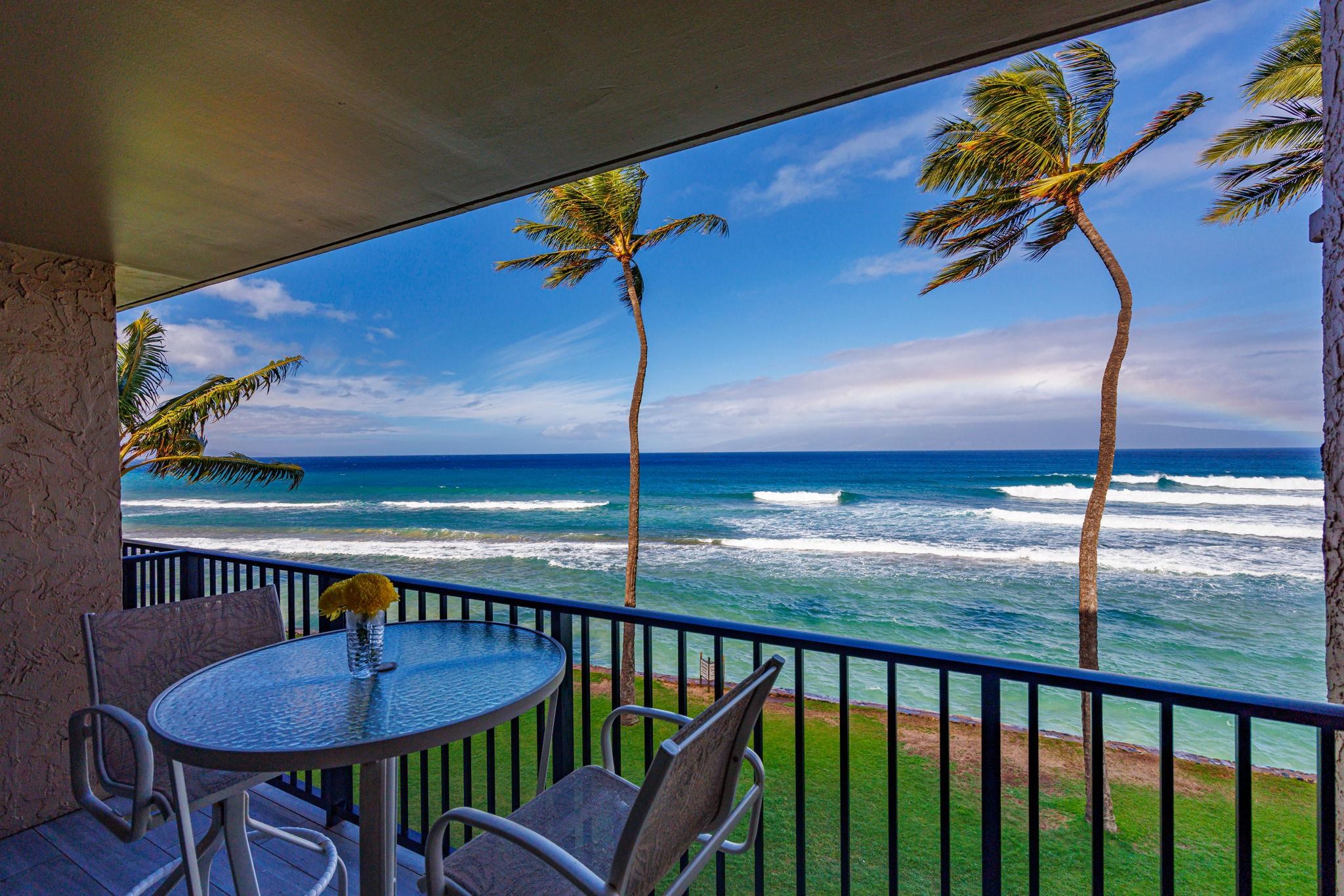 3543 Lower Honoapiilani Road, Unit F303 Lahaina, HI 96761 - Photo 17 of 20 a view of a dining room with furniture window and wooden floor