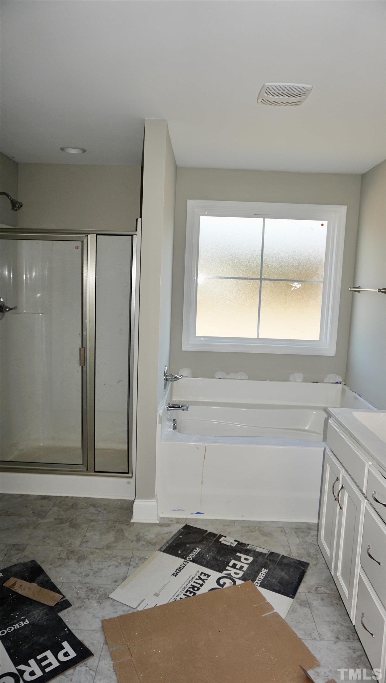 10519 West Old Spring Hope Road Spring Hope, NC 27882 - Photo 25 of 30 an empty room with a window
