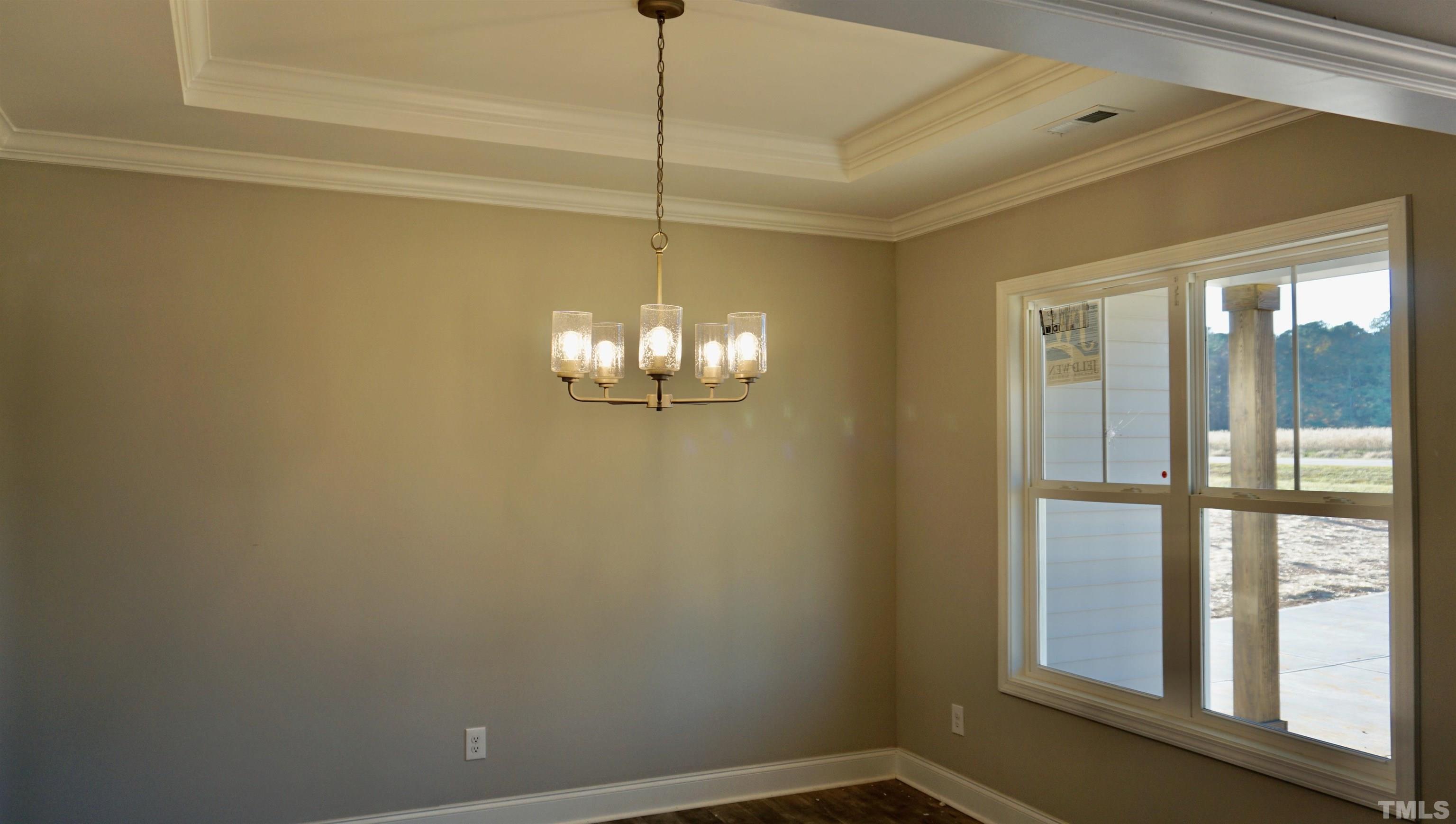 10519 West Old Spring Hope Road Spring Hope, NC 27882 - Photo 5 of 30 a view of a livingroom with a chandelier fan