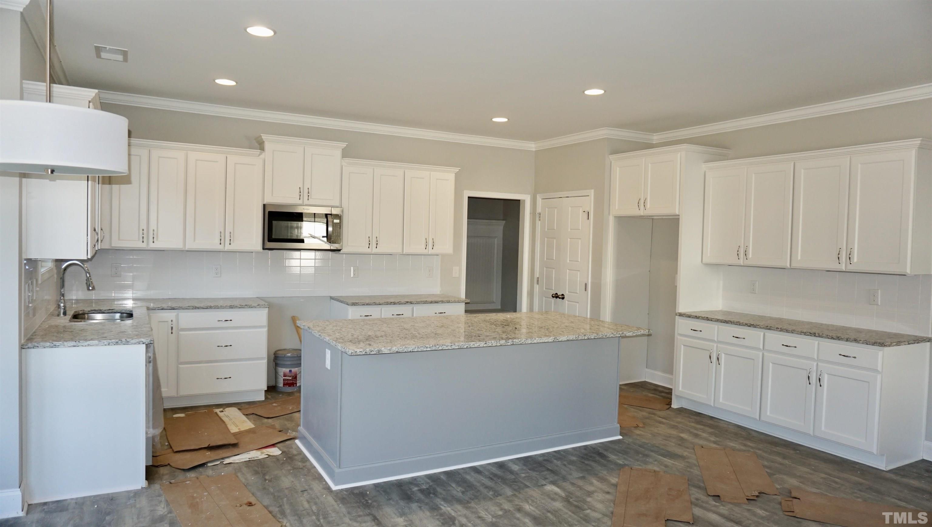 10519 West Old Spring Hope Road Spring Hope, NC 27882 - Photo 10 of 30 a large kitchen with cabinets