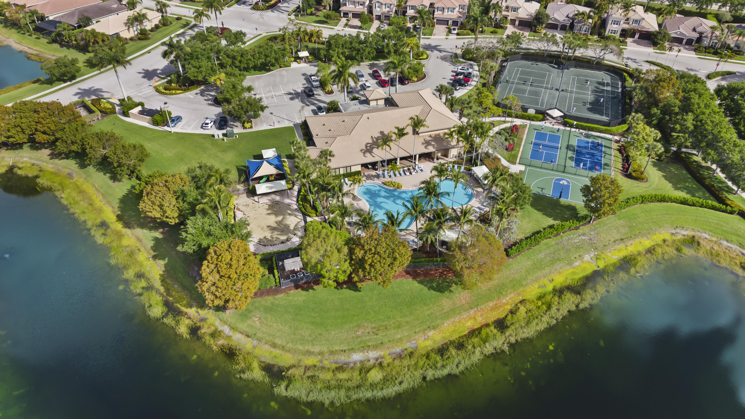 6513 Monterey Point, Unit 201 Naples, FL 34105 - Photo 34 of 35 45_the marbella lakes clubhouse (1)