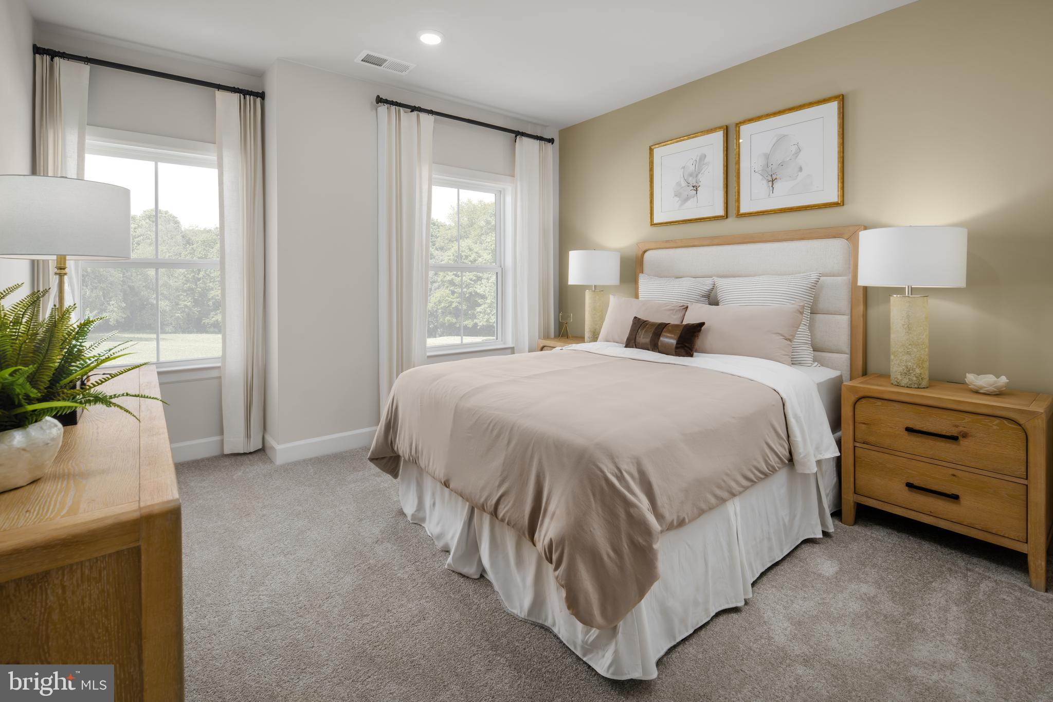 9404 Gerst Road Perry Hall, MD 21128 - Photo 14 of 22 a spacious bedroom with a bed and a window