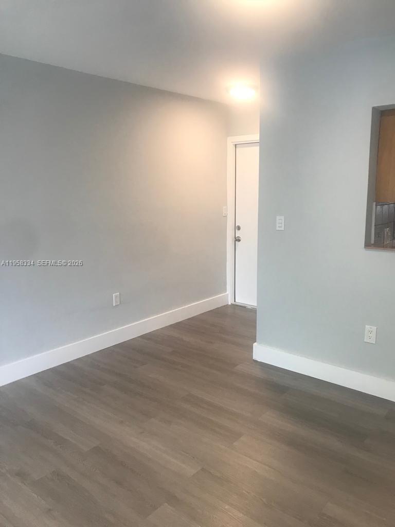 7570 Southwest 82nd Street, Unit F209 Miami, FL 33143 - Photo 6 of 13 a view of an empty room