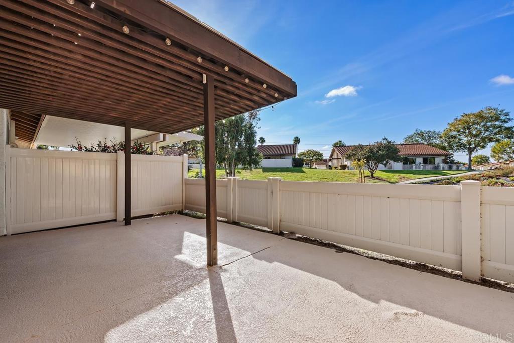 1741 Charleston Lane Encinitas, CA 92024 - Photo 16 of 18 a view of a patio with table and chairs