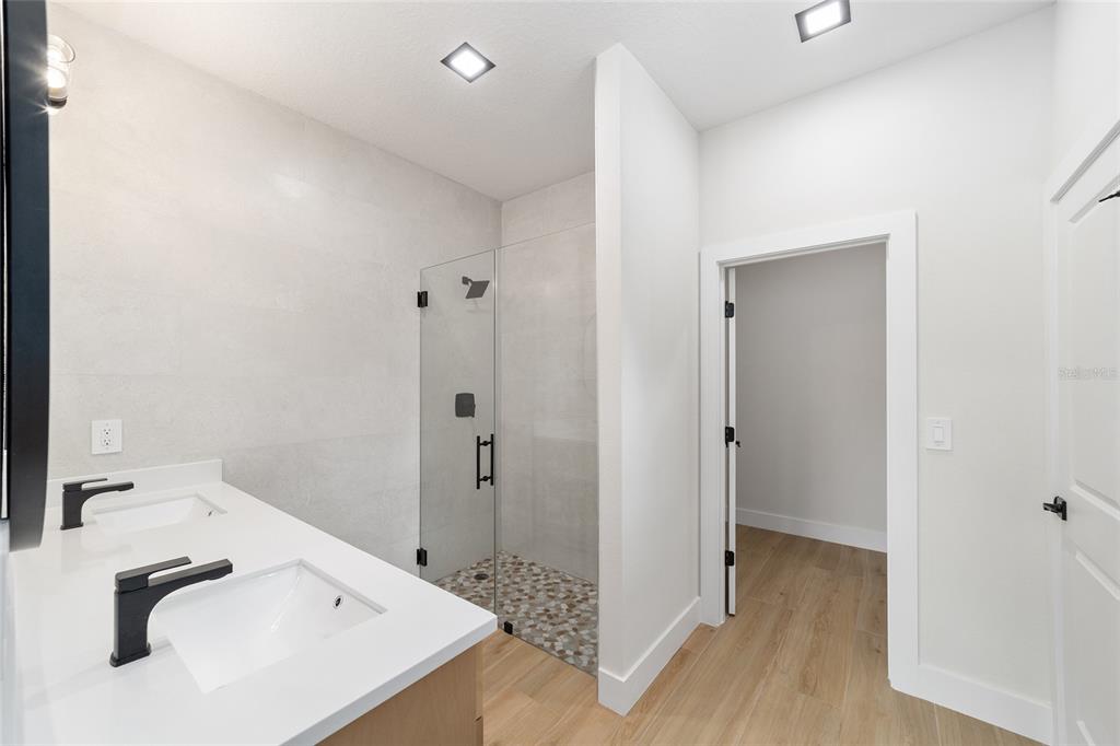 4380 Southwest 159th Court Ocala, FL 34481 - Photo 19 of 52 a bathroom with a tub sink and shower