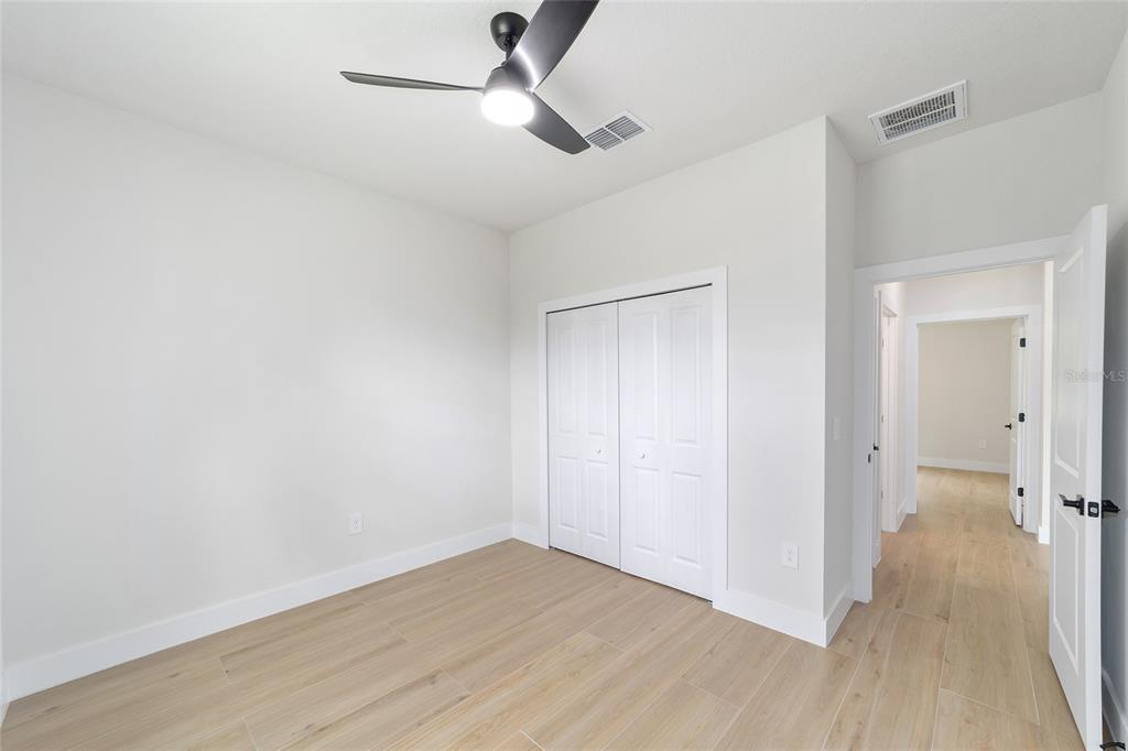 4380 Southwest 159th Court Ocala, FL 34481 - Photo 24 of 52 wooden floor in an empty room