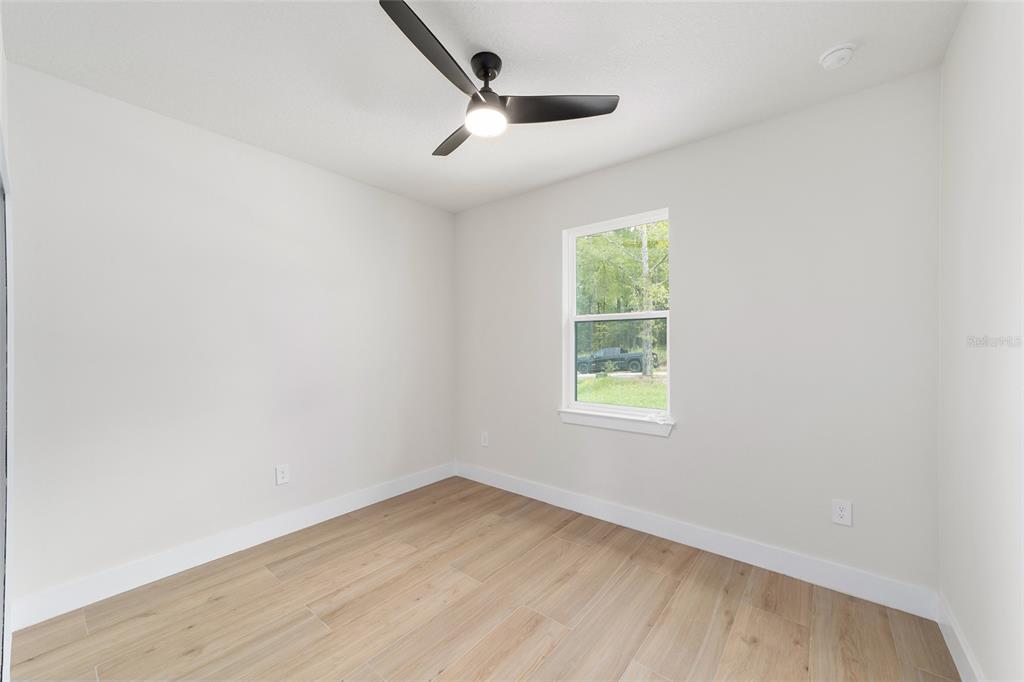 4380 Southwest 159th Court Ocala, FL 34481 - Photo 27 of 52 an empty room with a window
