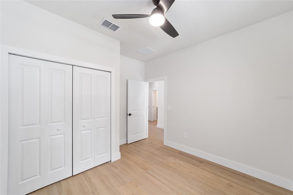 4380 Southwest 159th Court Ocala, FL 34481 - Photo 30 of 52 wooden floor in an empty room