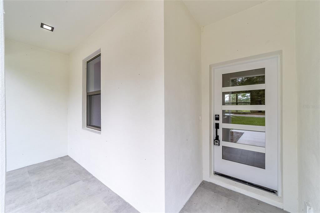 4380 Southwest 159th Court Ocala, FL 34481 - Photo 3 of 52 a view of an empty room and fire place