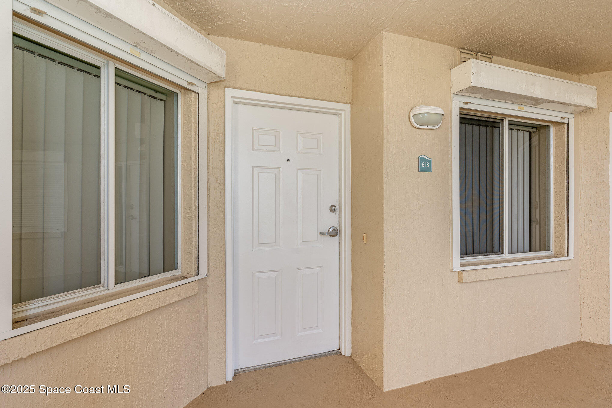 1575 North Hwy A1A, Unit 613 Indialantic, FL 32903 - Photo 1 of 23 a view of front door