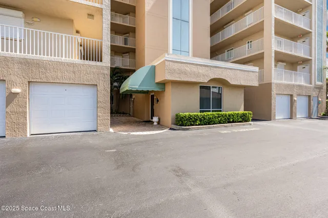 a front view of a building with a street