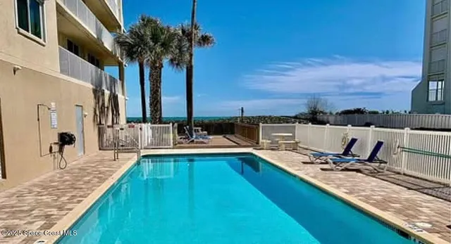 a view of a kitchen with a sink and dishwasher