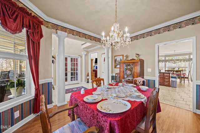 a large bathroom with a sink a large mirror and vanity