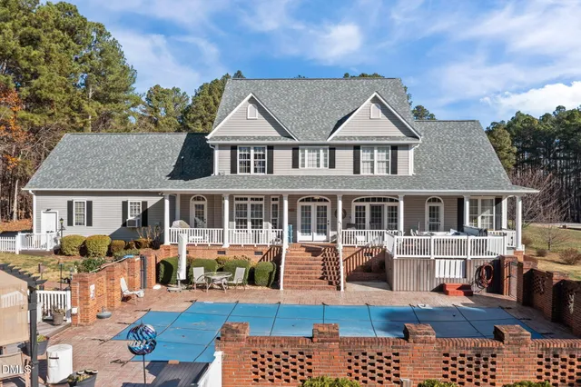 a view of a balcony with wooden floor
