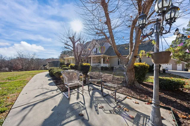 an aerial view of a house with outdoor space