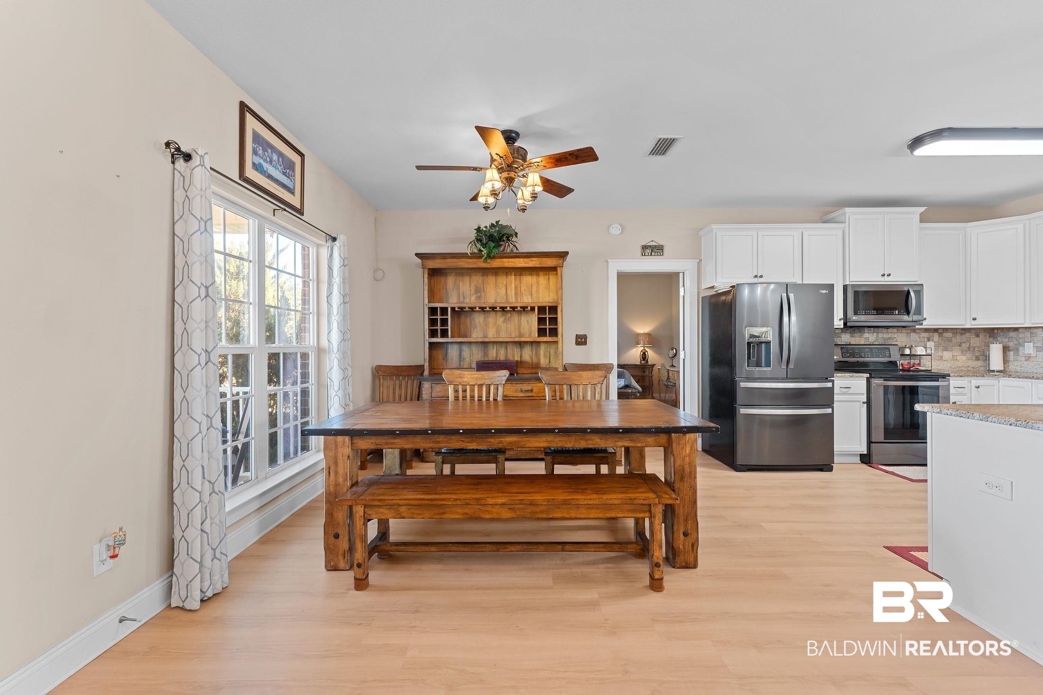 28980 Comstock Road Elberta, AL 36530 - Photo 12 of 38 Dining room featuring light wood-style flooring and a ceiling fan