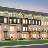 a front view of building with yard