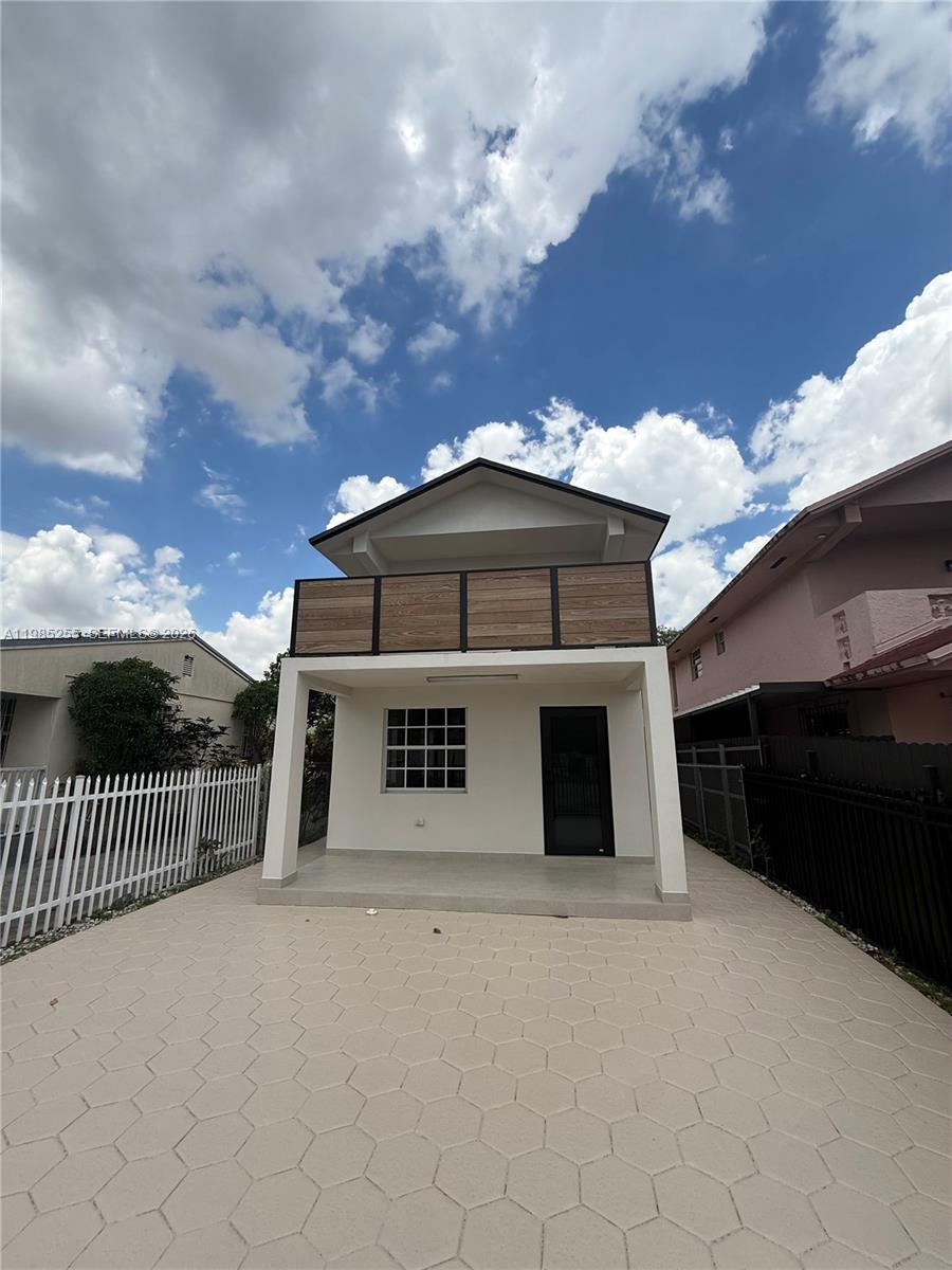 a view of a house with a balcony