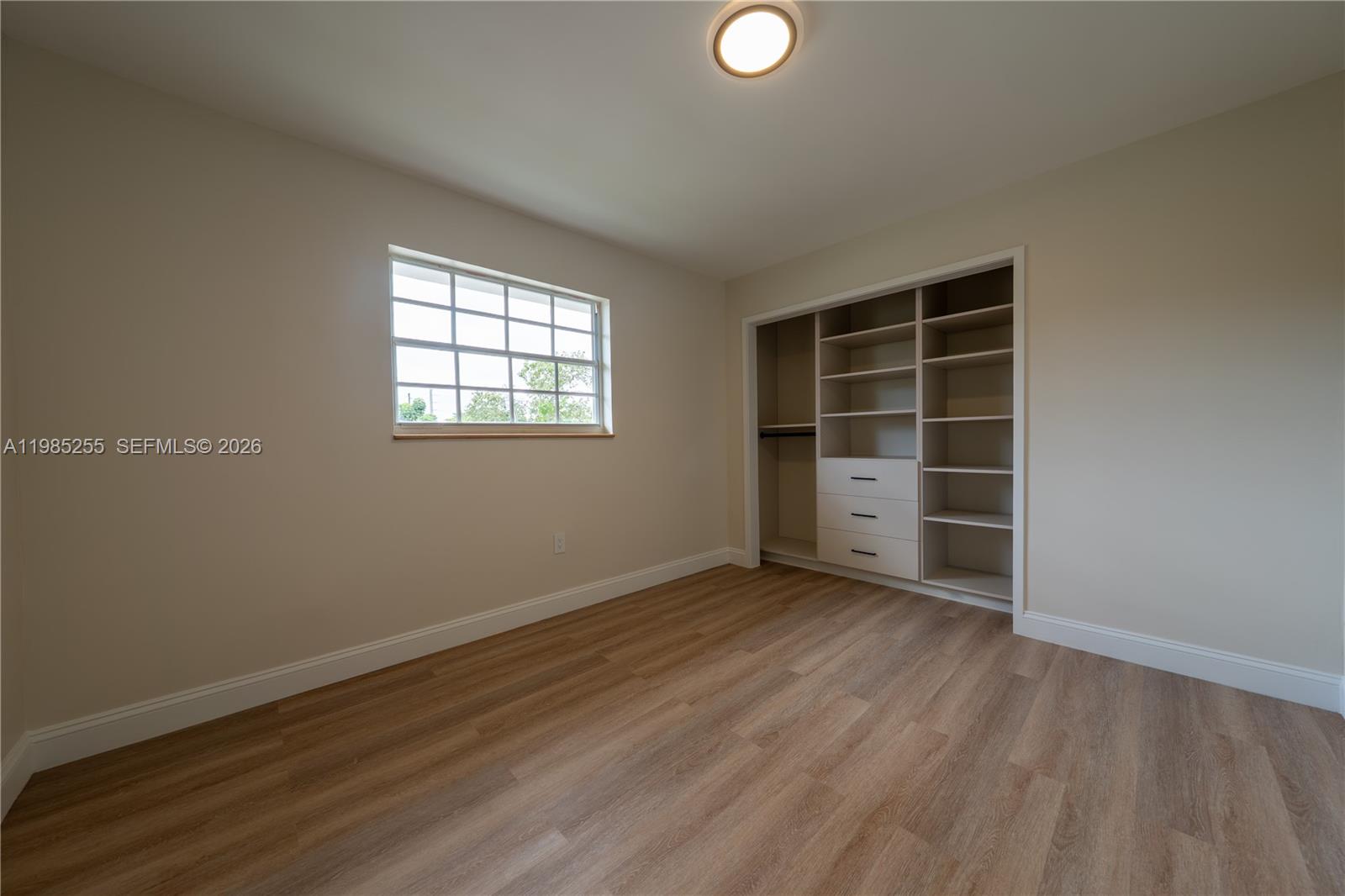 370 Flagami Boulevard Miami, FL 33144 - Photo 22 of 67 an empty room with a empty space and window