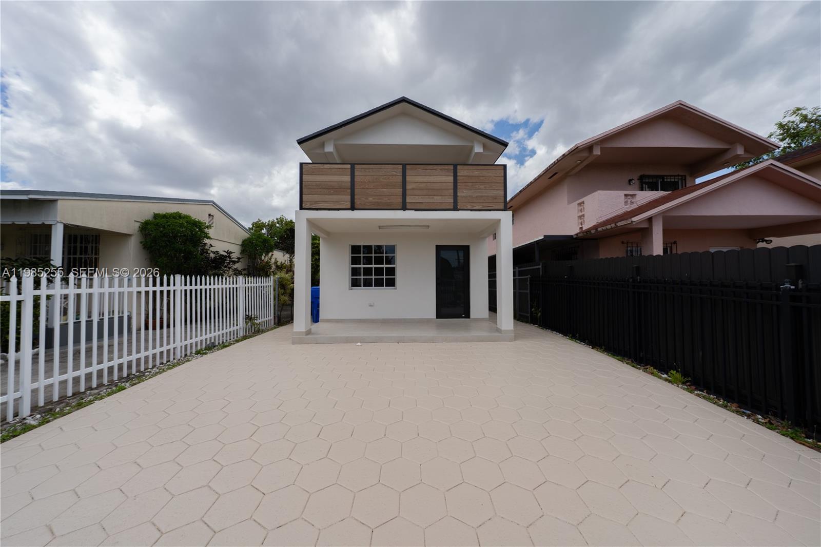 370 Flagami Boulevard Miami, FL 33144 - Photo 46 of 67 a view of a house with a balcony