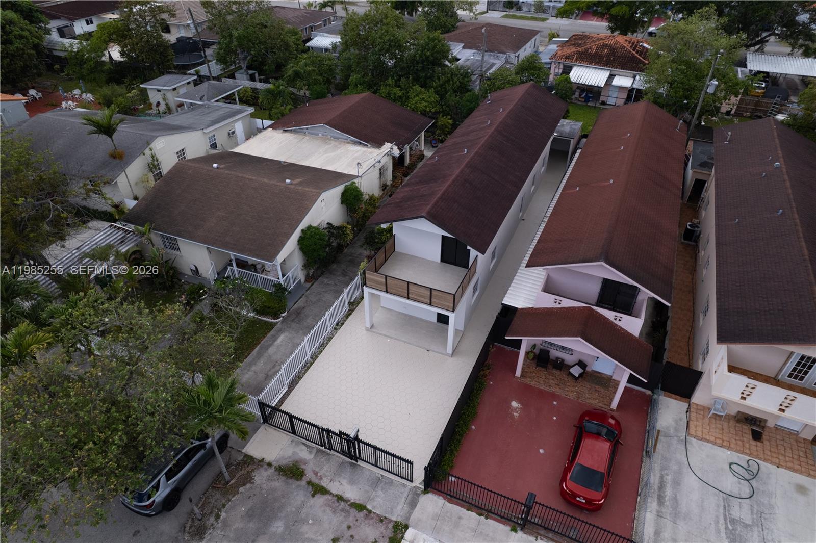 370 Flagami Boulevard Miami, FL 33144 - Photo 51 of 67 an aerial view of a house with a yard