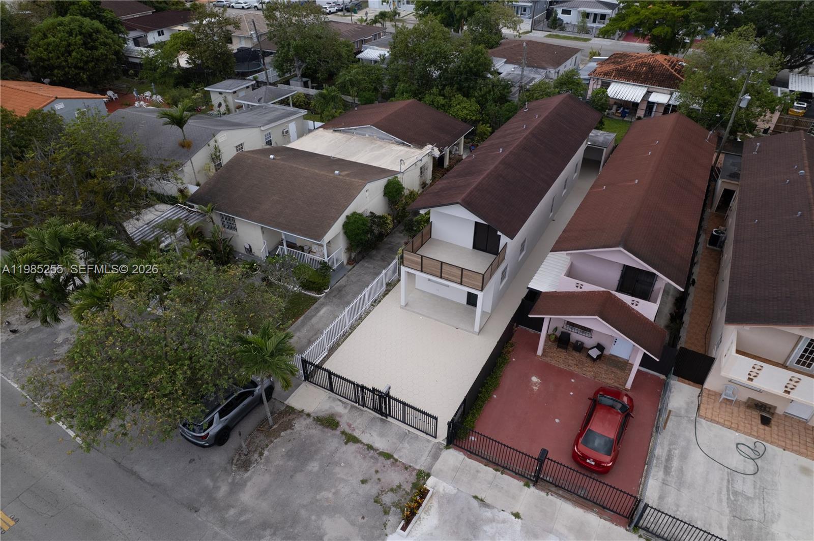 370 Flagami Boulevard Miami, FL 33144 - Photo 54 of 67 an aerial view of a house with garden space and street view
