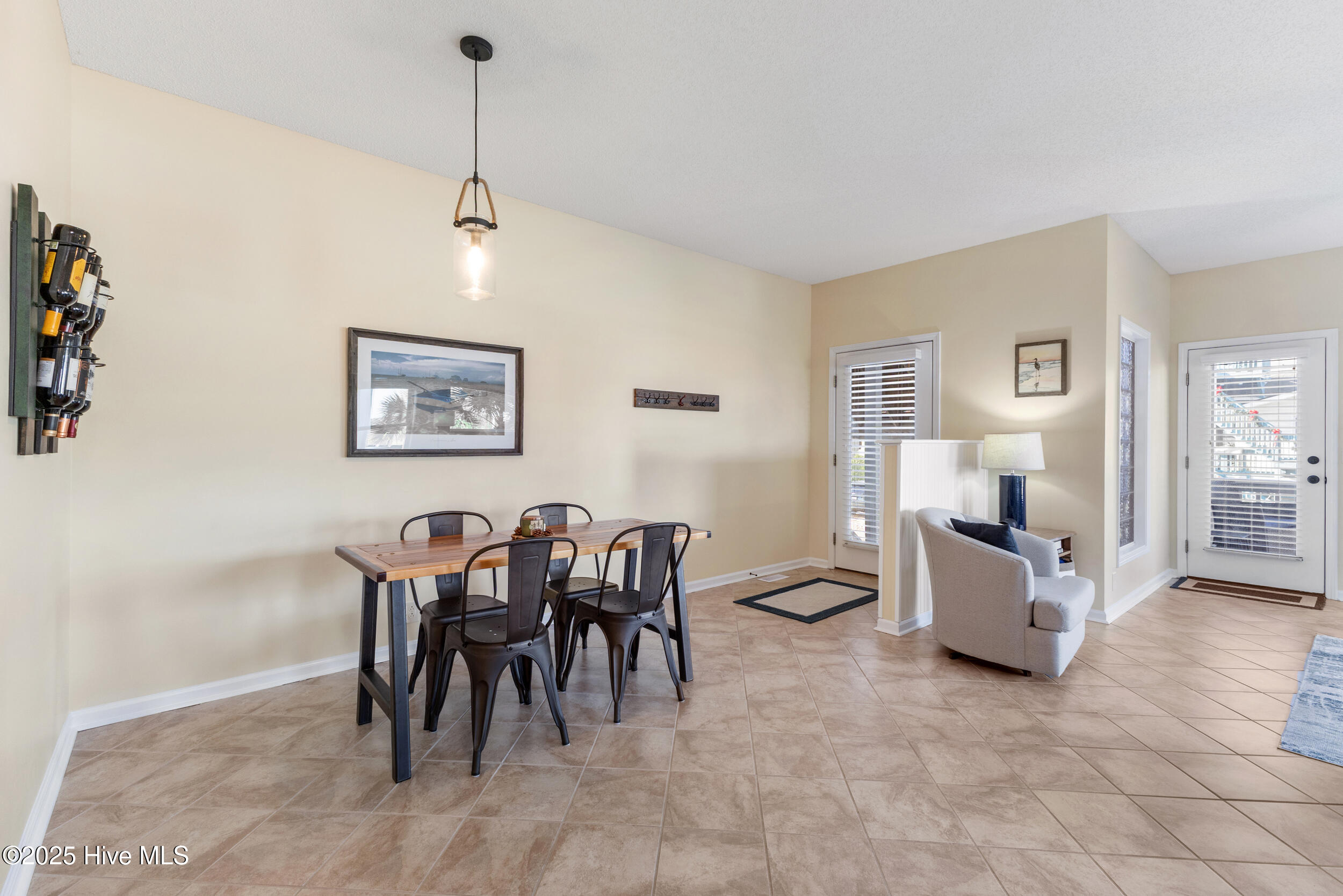405 27th Street, Unit B Sunset Beach, NC 28468 - Photo 12 of 25 dining front door