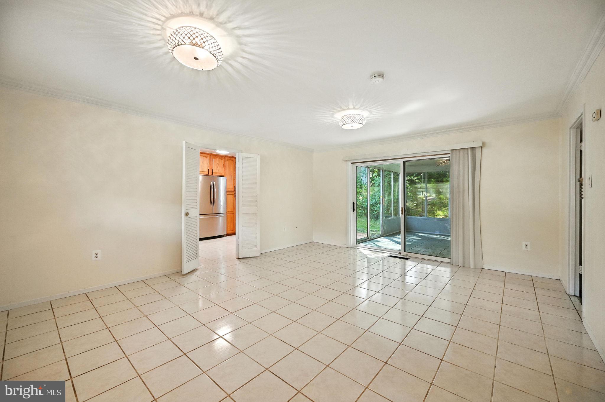 9301 Montpelier Drive Laurel, MD 20708 - Photo 18 of 23 an empty room with windows