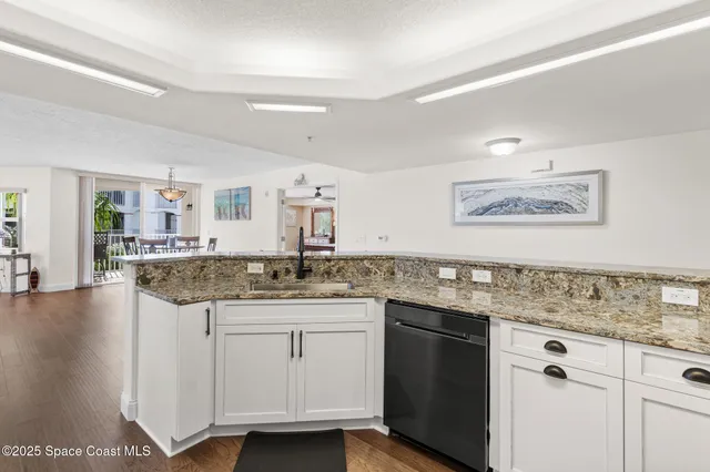 a bed room with furniture and a table