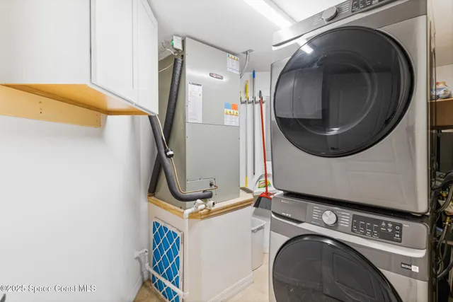 a view of parking garage with cars parked