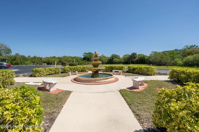 a view of balcony with a small yard