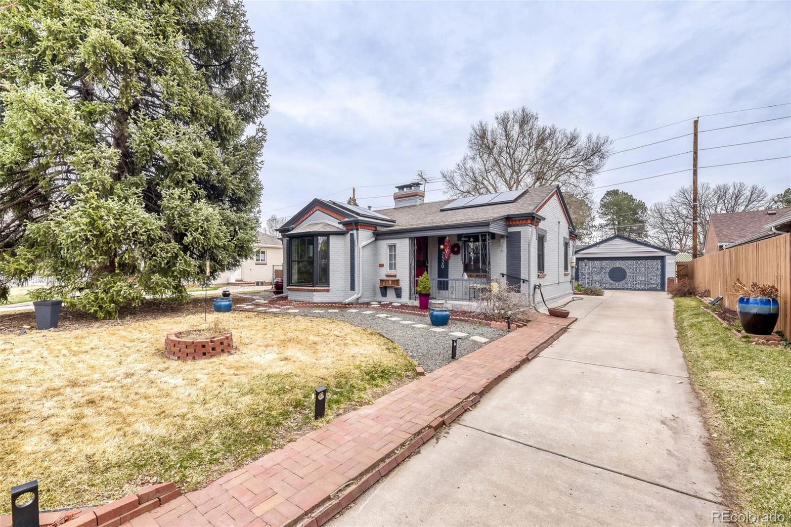 a swimming pool with outdoor seating and yard