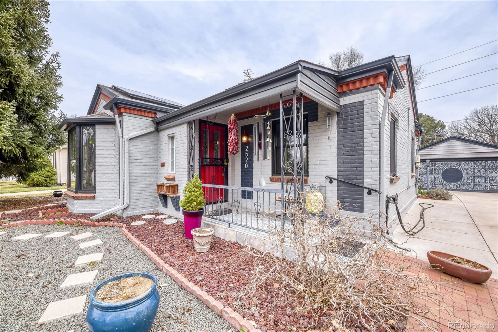 2520 North Locust Street Denver, CO 80207 - Photo 3 of 39 a front view of a house