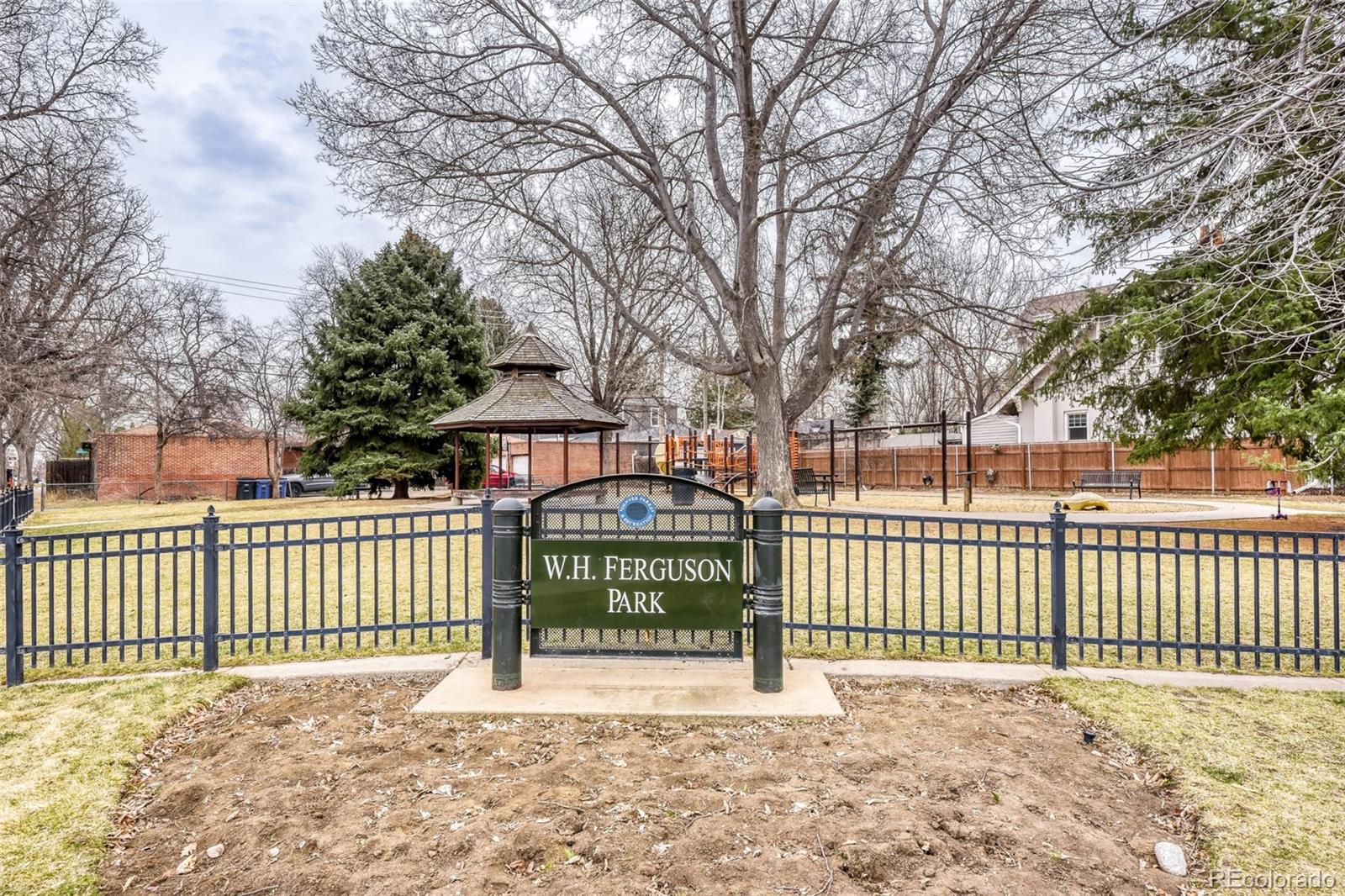 2520 North Locust Street Denver, CO 80207 - Photo 35 of 39 a view of outdoor space with deck and a garden
