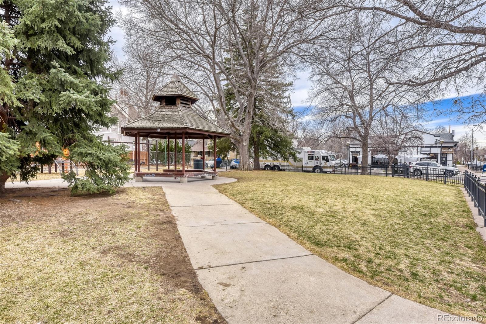 2520 North Locust Street Denver, CO 80207 - Photo 36 of 39 a swimming pool with outdoor seating