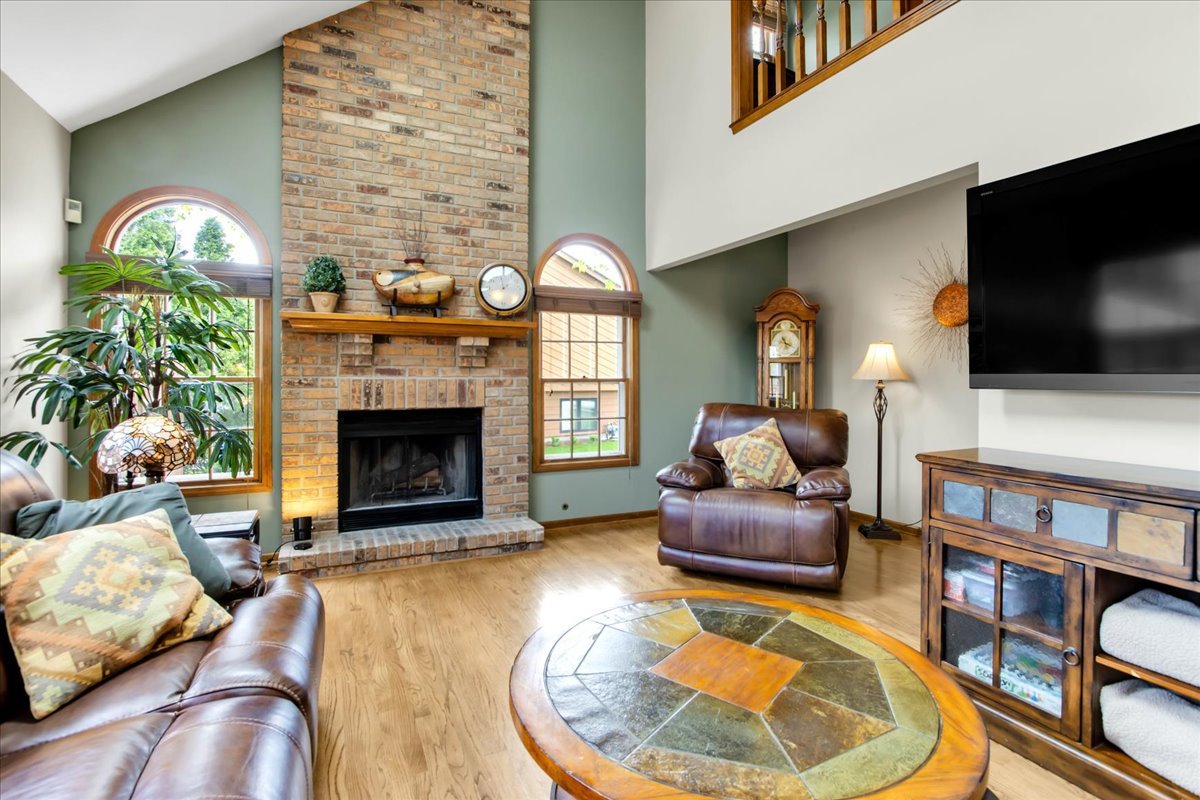 76 Red Fox Run Montgomery, IL 60538 - Photo 12 of 28 a living room with furniture and a fireplace
