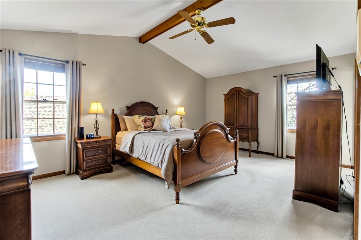 76 Red Fox Run Montgomery, IL 60538 - Photo 15 of 28 a bedroom with a bed and window