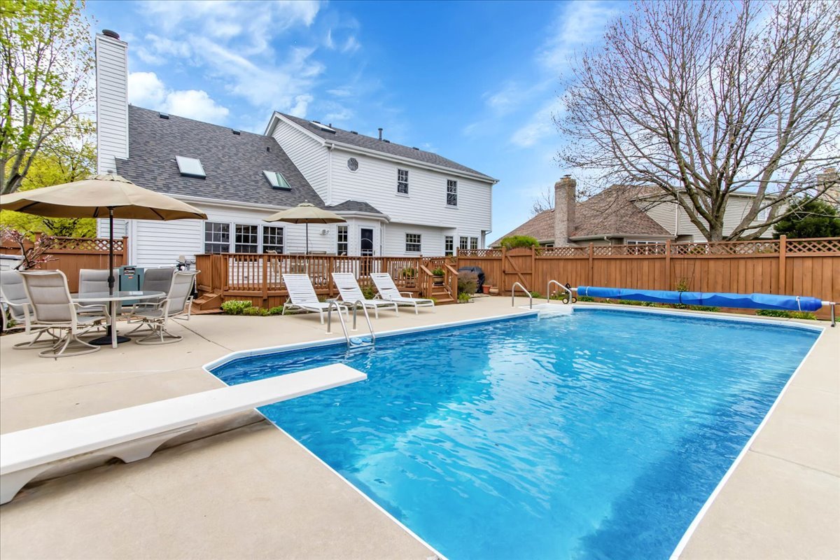 76 Red Fox Run Montgomery, IL 60538 - Photo 2 of 28 a view of a house with swimming pool