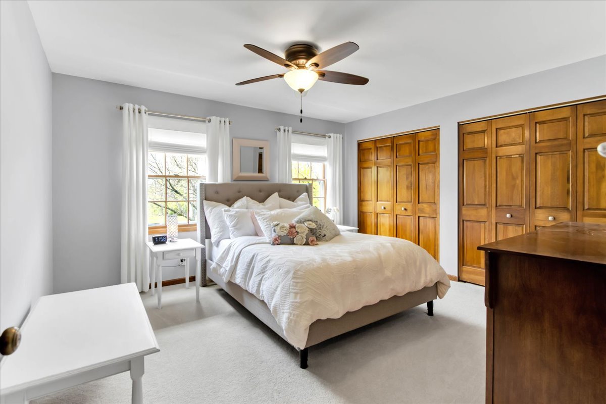 76 Red Fox Run Montgomery, IL 60538 - Photo 23 of 28 a bedroom with a bed and window