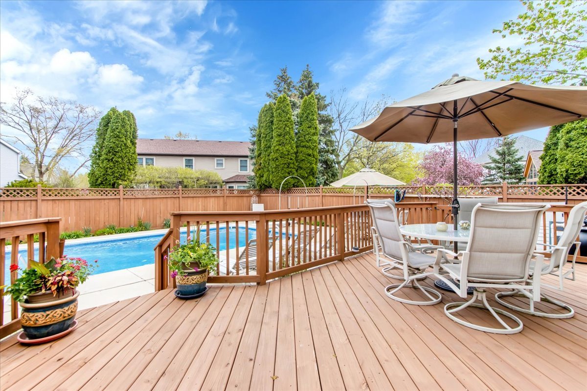 76 Red Fox Run Montgomery, IL 60538 - Photo 4 of 28 a view of balcony with outdoor seating and wooden floor