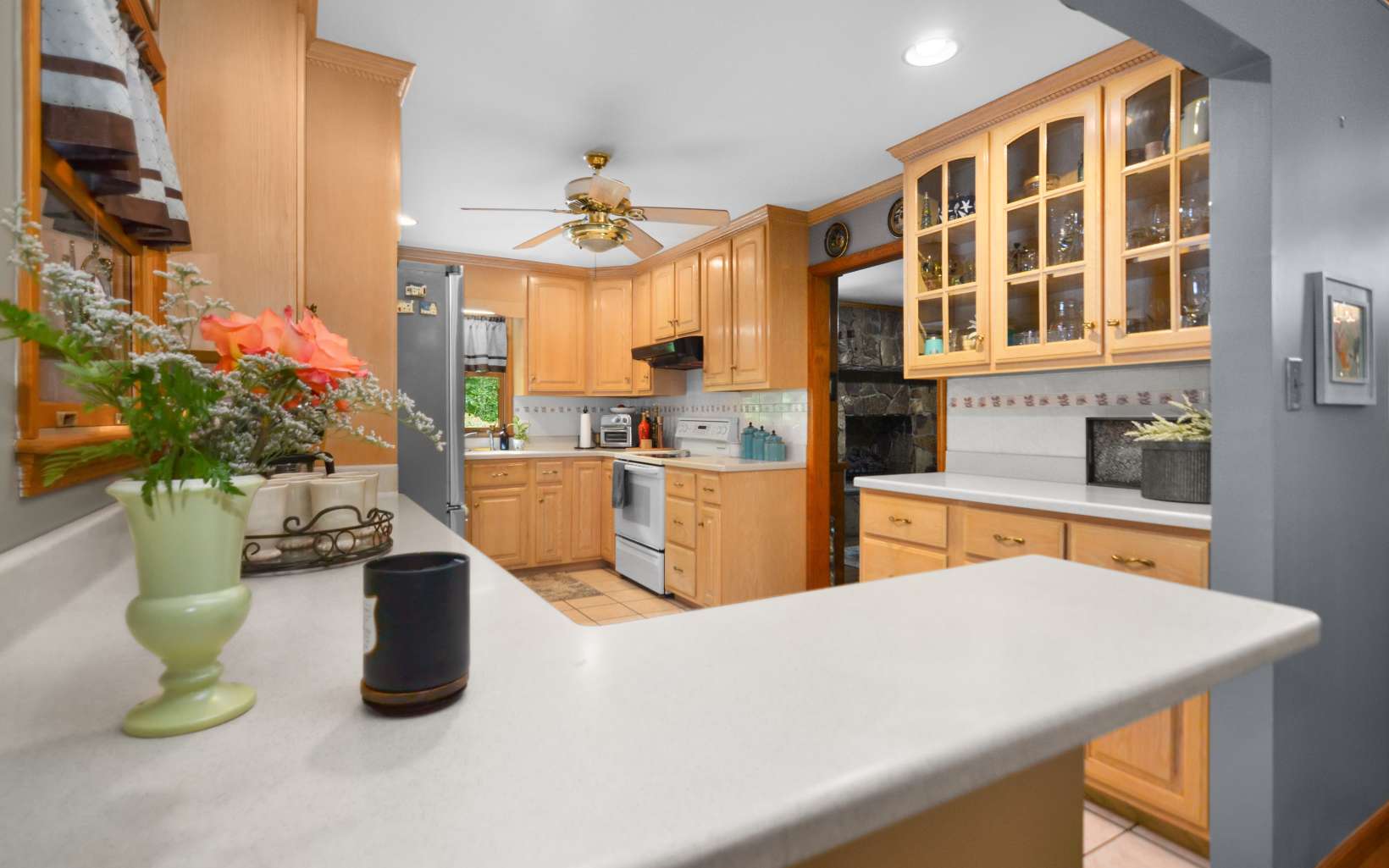 2850 Appalachian Highway Blue Ridge, GA 30513 - Photo 14 of 30 a kitchen with a sink a counter and chairs