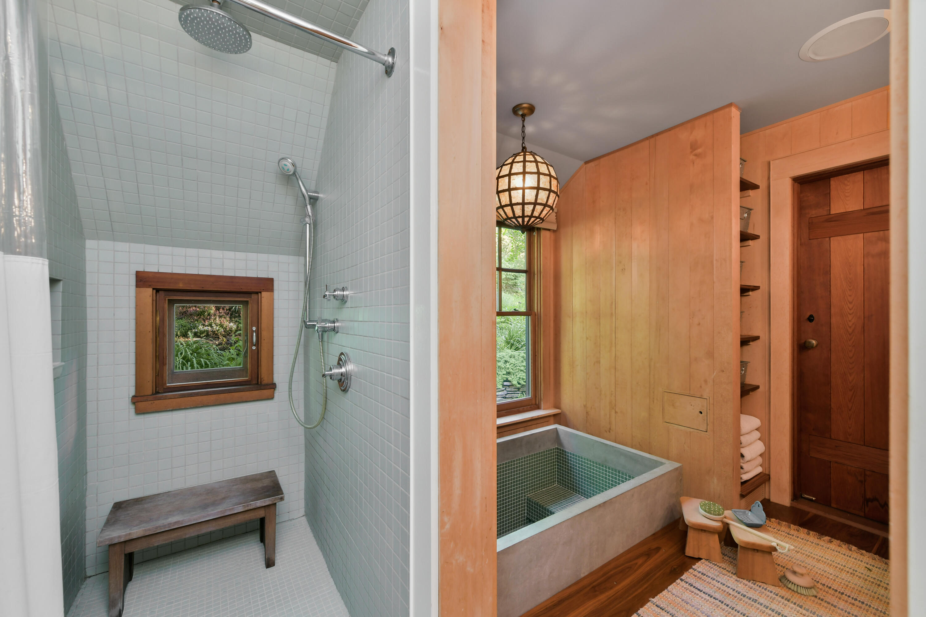 32 Higgins Hollow Road Truro, MA 02666 - Photo 15 of 38 a bathroom with a tub a sink and glass door