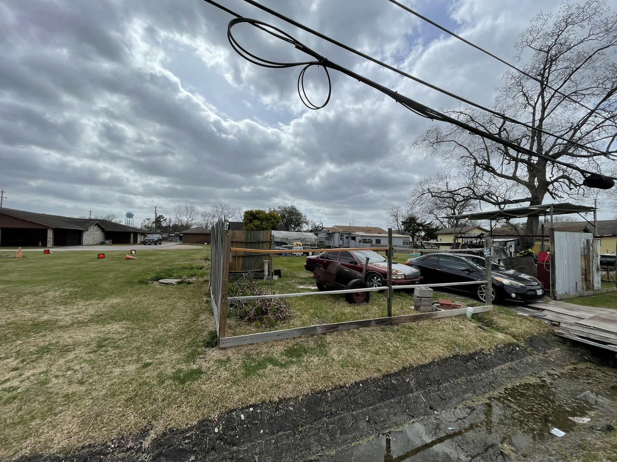 2202 Jones Road Baytown, TX 77521 - Photo 7 of 9 a view of a backyard with table and chairs