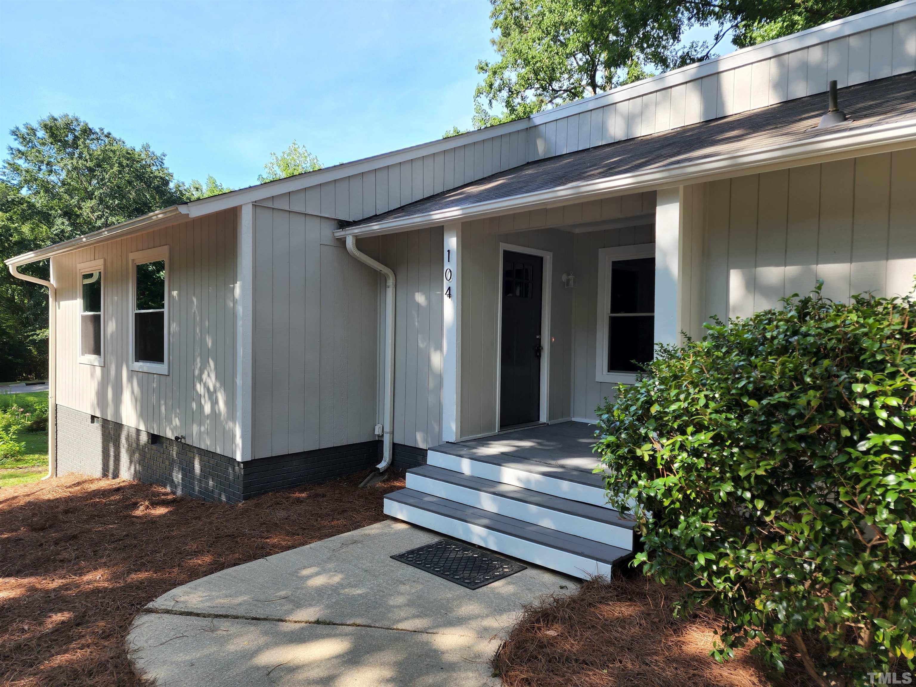 104 Trappers Run Drive Cary, NC 27513 - Photo 2 of 13 a view of a house with a yard