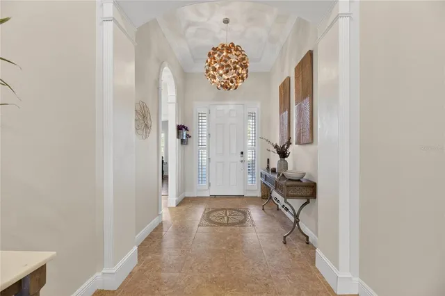 a bedroom with furniture and flat screen tv