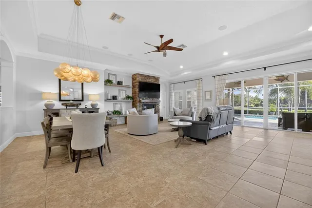 a view of a patio with dining table and chairs