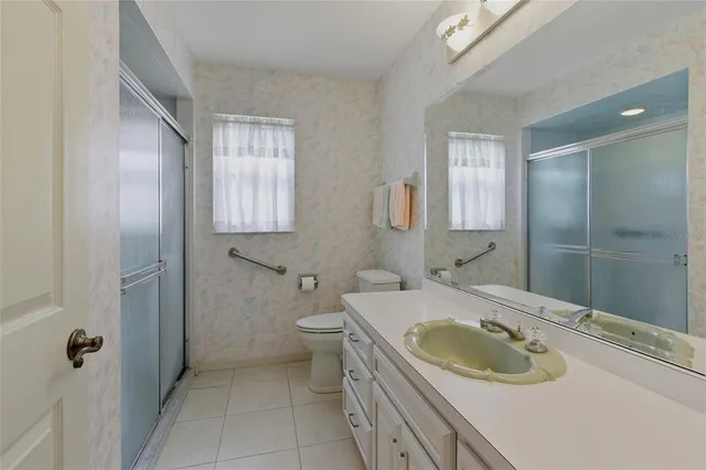 a bathroom with a sink and a toilet